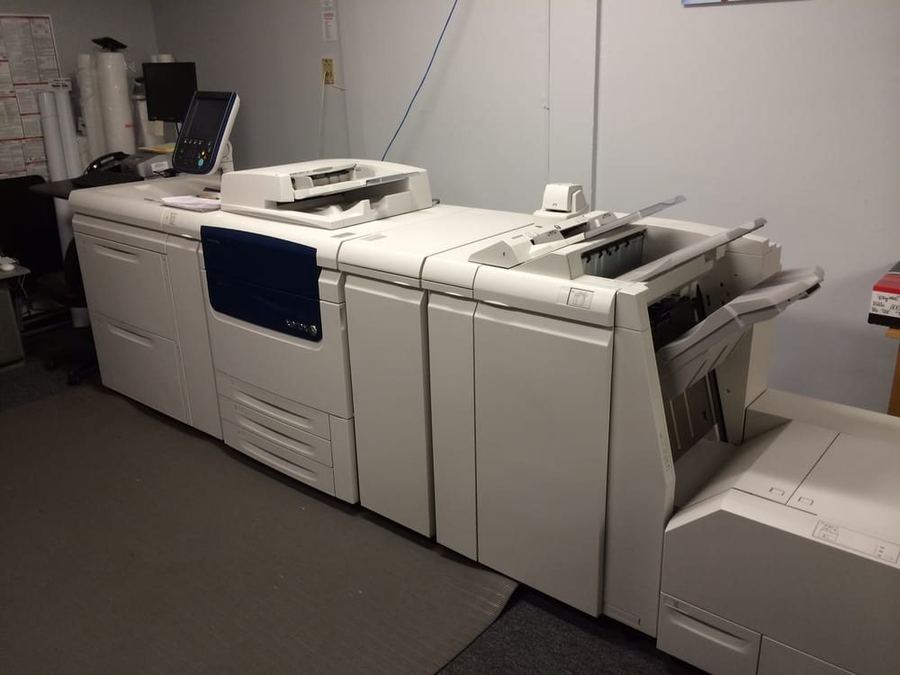 The digital press in the back room at The Printing House